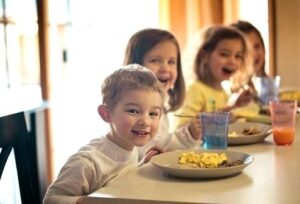 photo-of-children-eating-breakfast-kids-table-kitchen-faucets-reviews-the