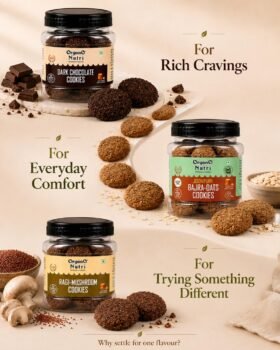 Three jars of Organ Nutri cookies Dark Chocolate Bajra Oats and Ragi Mushroom displayed with cookies on beige backdrop highlighting product variety