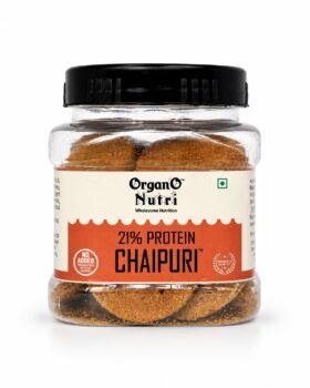 Jar of Organo Nutri ChaipurI cookies 21 protein clear label on orange band showing No Added Preservatives and Wholesome Nutrition edge detail