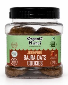 Jar of Organo Nutri Bajra Oats Cookies with a green label and black lid showing stacked cookies inside
