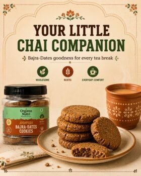 Plate of bajra dates cookies with a jar labeled Bajra Dates Cookies and a mug of chai against a decorative backdrop reading Your Little Chai Companion and Bajra Dates goodness for every tea break