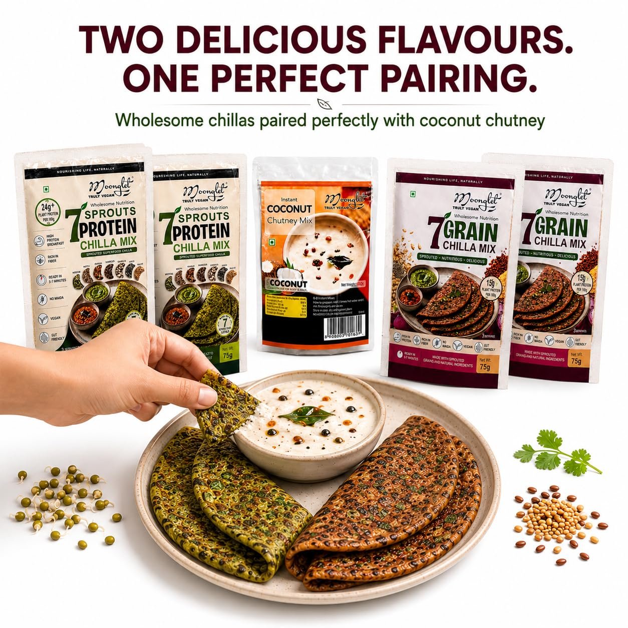 811DVqzKzRL_SL1254_ - OrganoNutri Assorted Moonglet protein chilla and grain mix pouches displayed behind a plate of chutney a hand dips a crisp chilla into the bowl Reduced background keeps focus on packaging and food